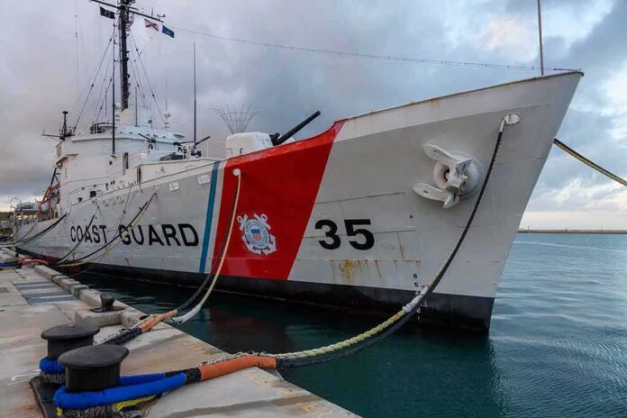 shutterstock_1259473303 Coast Guard cutter moored at a pier