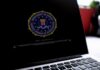 Laptop screen displaying FBI seal