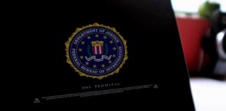 Laptop screen displaying FBI seal