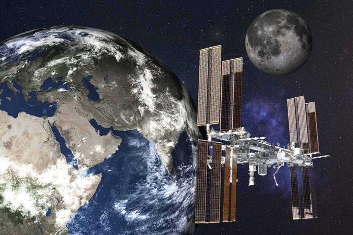 shutterstock_1674331843 International Space Station orbiting Earth with the Moon in the background