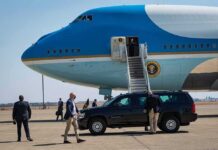 UN Week Twist: Trump Leaves, Bibi Skips Security detail near blue and white aircraft with staircase and SUV