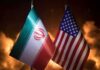 Trump And Iran Trade Stark UN Warnings Iran and United States flags side by side
