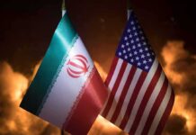 Trump And Iran Trade Stark UN Warnings Iran and United States flags side by side