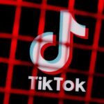 TikTok logo behind red grid pattern