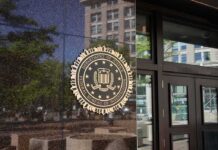 FBI Intercepts ‘Hamza’ Before The Hit FBI seal on a building entrance