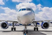 Worldwide Fuel Freeze Slams Iran Flights Commercial airplane on runway, front view