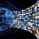 Fauci Cornered—New Lie, New Case Digital globe with curved wall of multimedia screens