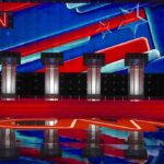 Shock Flip: Tucker Praises Democrat Debate stage with four podiums and colorful star backdrop