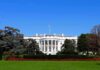 Pageant Night Allegation Shocks Washington The White House facade with flag and gardens
