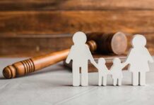 Houston Custody Clash Ends In Blood Paper cutout family with gavel in background