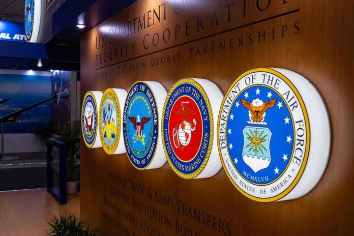 shutterstock_1119131606 Military department seals displayed on a wall