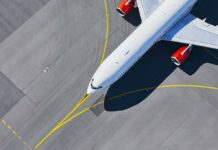 Cockpit Mutiny Stops Death Dive Airplane taxiing on airport tarmac from above
