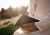 Pope Leo Diagnosed With Lung Cancer Person in white robe holding a Bible outdoors