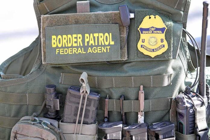 shutterstock_1646704639 Tactical vest with law enforcement gear and tools