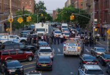 Coked-Up Driver Mows Down Baby Police vehicles and officers block a city street during an active scene