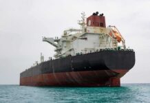 Trump-Putin Fuel Deal Stuns Washington Large oil tanker anchored in calm sea