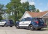 Birthday Tragedy: Chilling Louisiana Mystery Two police SUVs parked near a suburban house