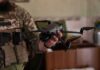 Who Cut Ukraine’s Lifeline Mid-Strike? soldier holding a quadcopter drone