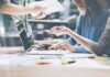 Late Cash Panic? Three Districts Dropped Team collaborating at a laptop in a modern workspace