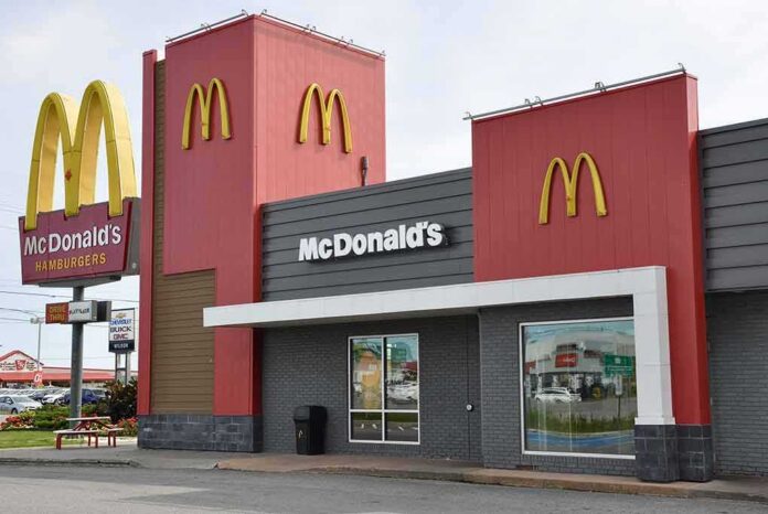 shutterstock_711932764 McDonald's restaurant exterior with golden arches